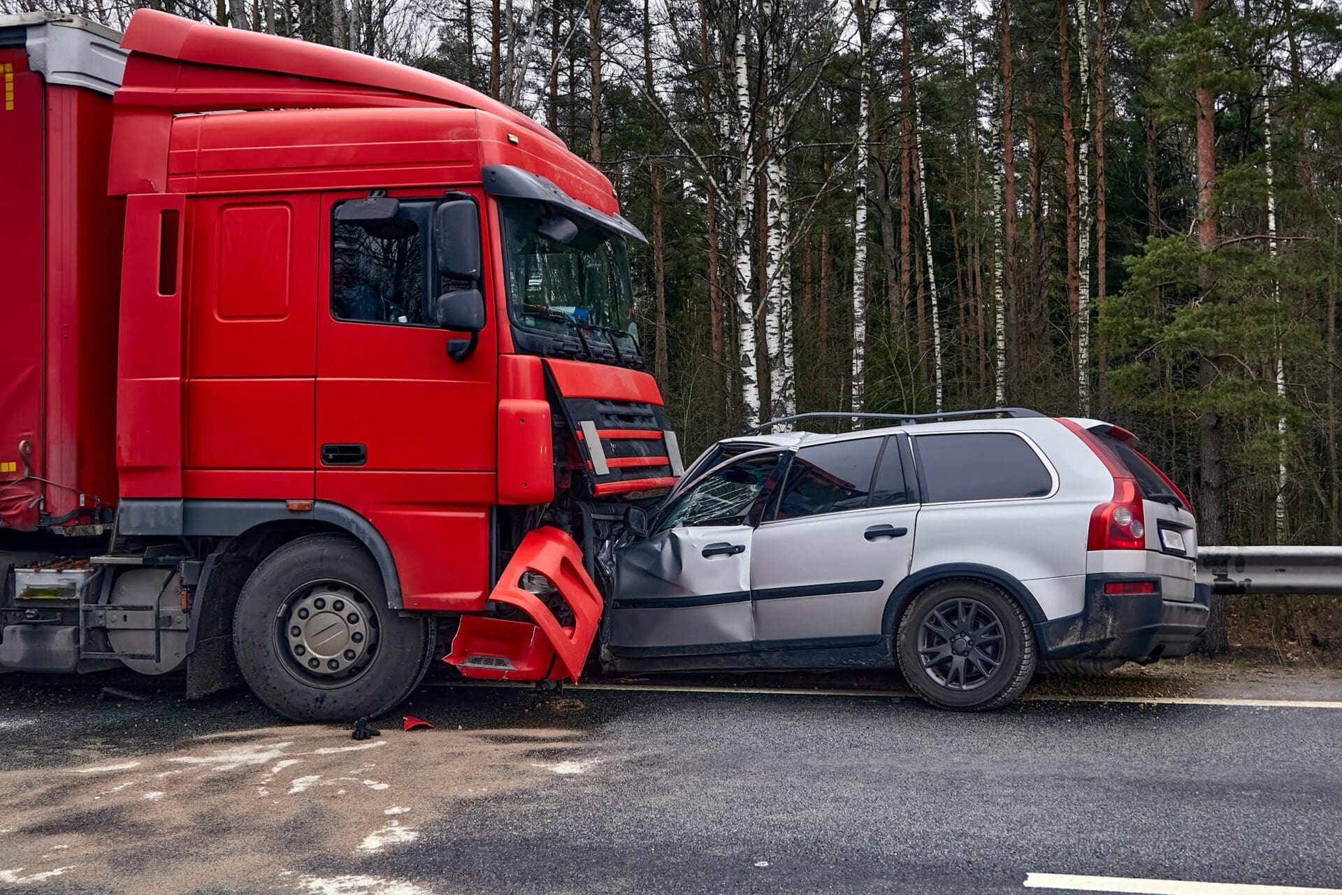 Car after a collision with a heavy truck trucking accident