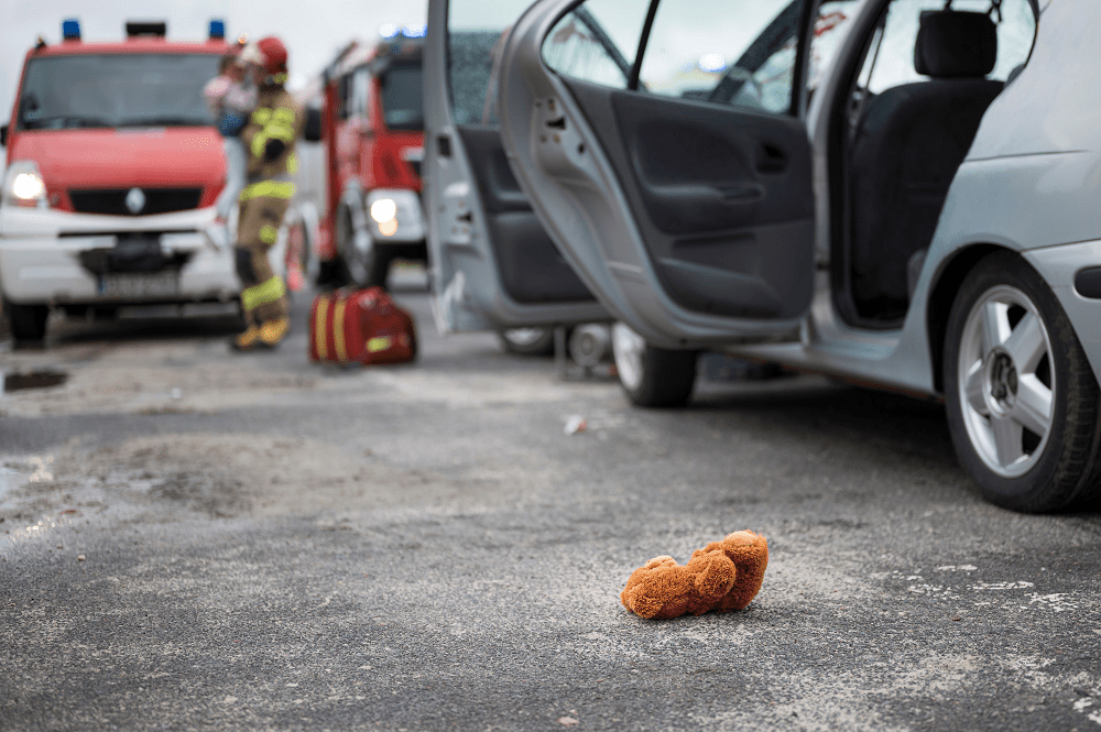 stuffedanimal at an accident stuffed animal on the ground after a car accident
